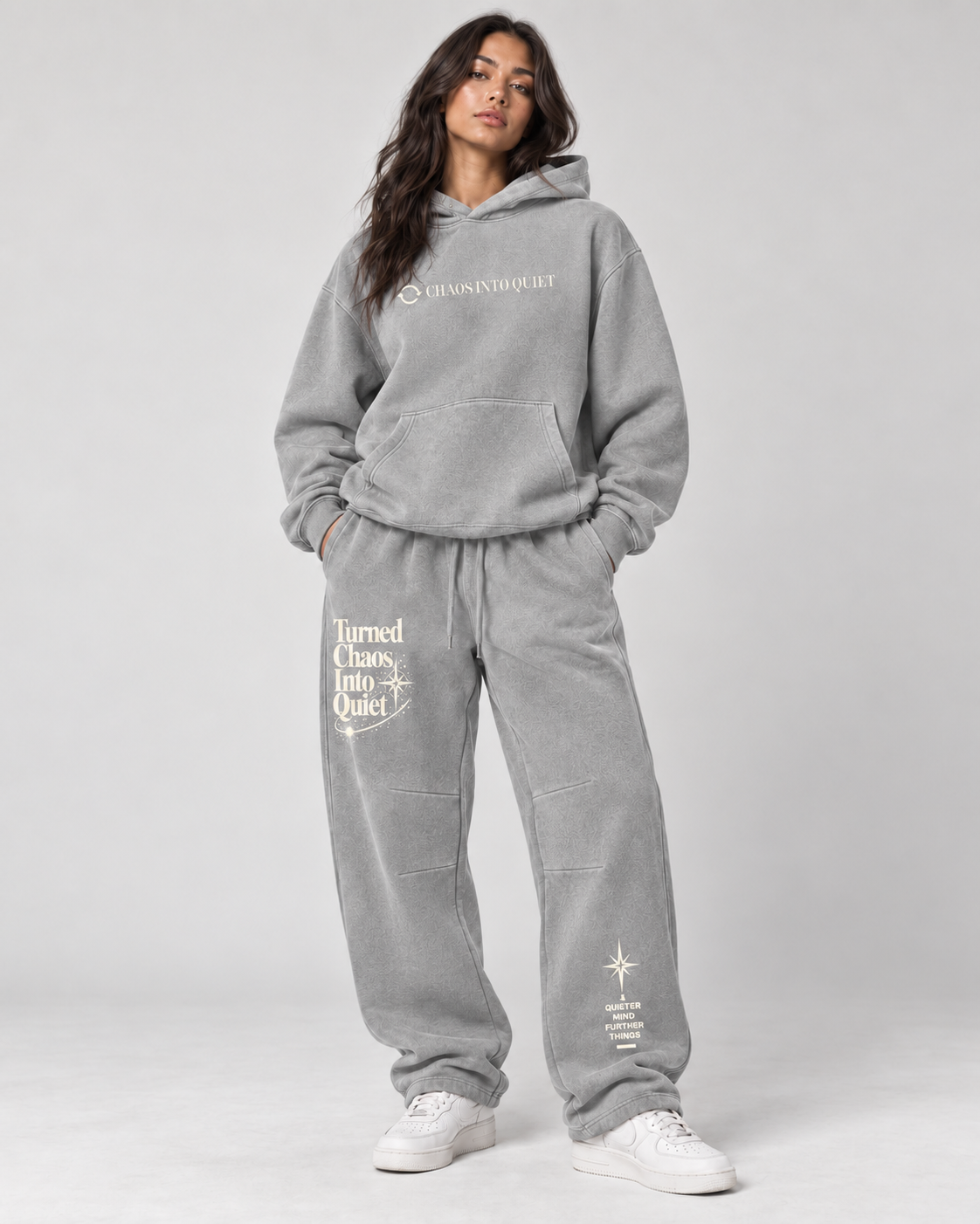 Light gray vintage wash boxy hoodie with Chaos Into Quiet front chest graphic